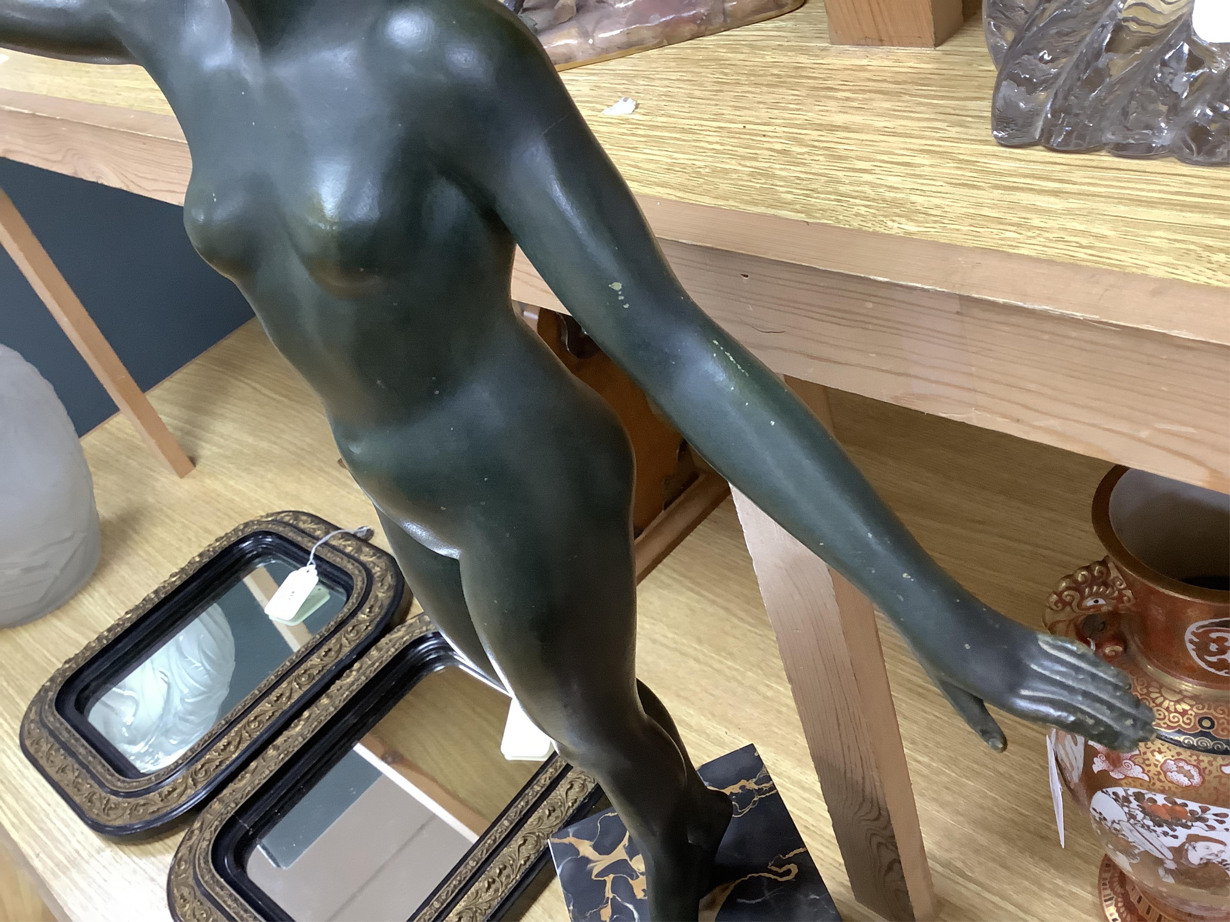 Segundo, a bronze nude female, on marble plinth, 47cm wide, 67cm high